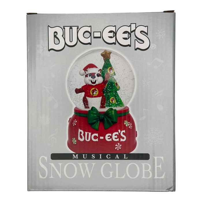 Red and green musical snow globe - plays "We Wish You a Merry Christmas"