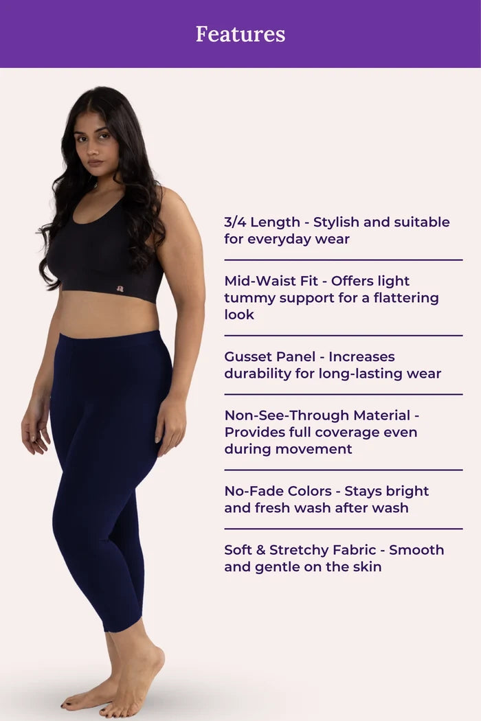 Woman wearing a black sports bra and navy blue leggings with feature text on a beige background