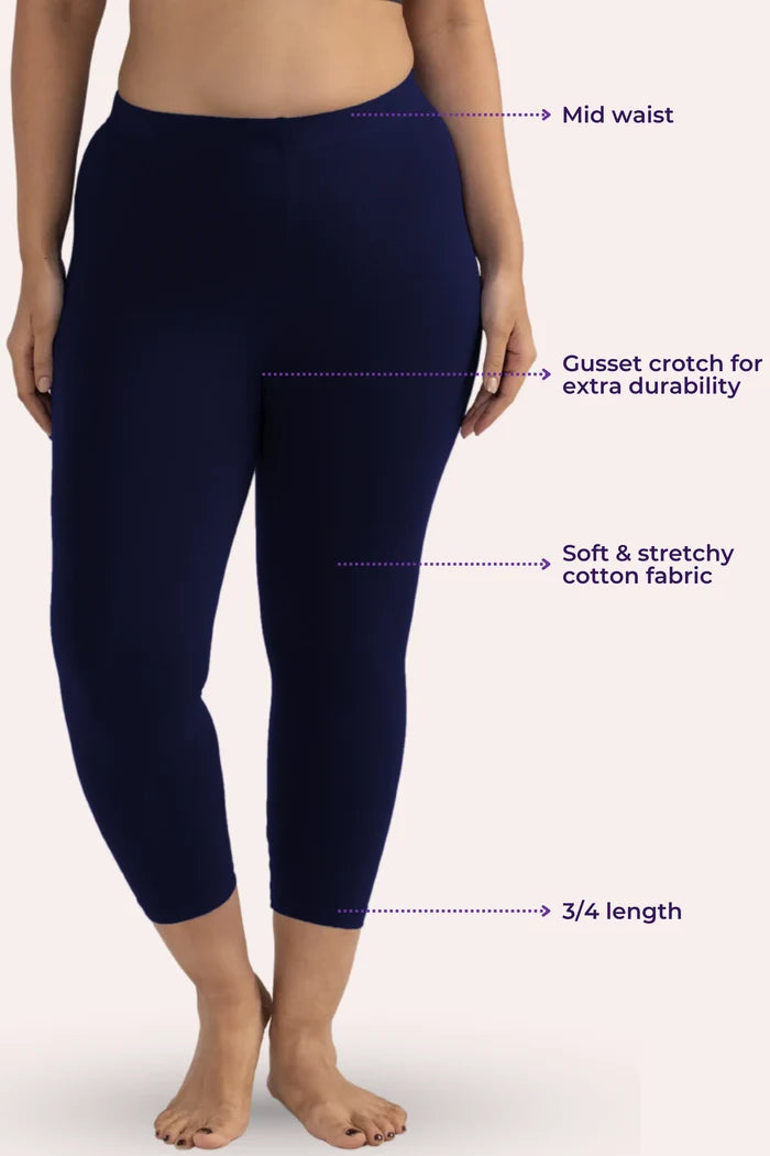 Navy blue leggings with text labels on a white background