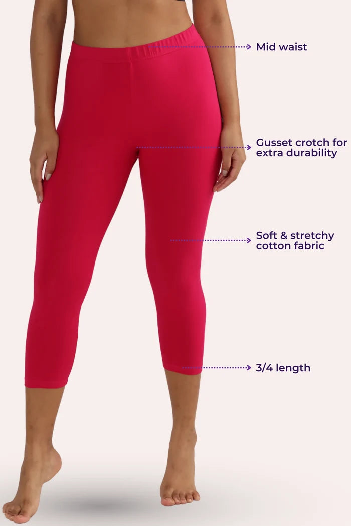 Dark pink cropped leggings with text labels on a white background