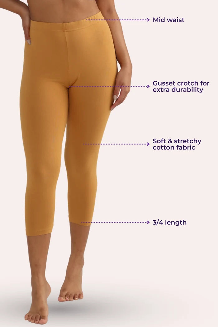 Caramel cropped leggings with text labels on a white background
