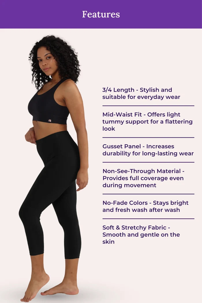 Woman wearing black cropped leggings with feature text on a white background