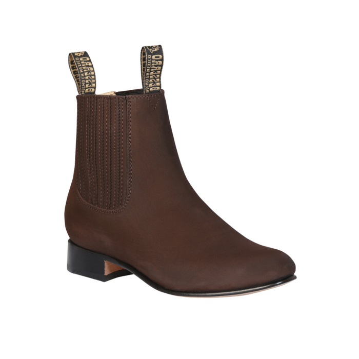 leather short western ankle boot with elastic side panels and low heel.