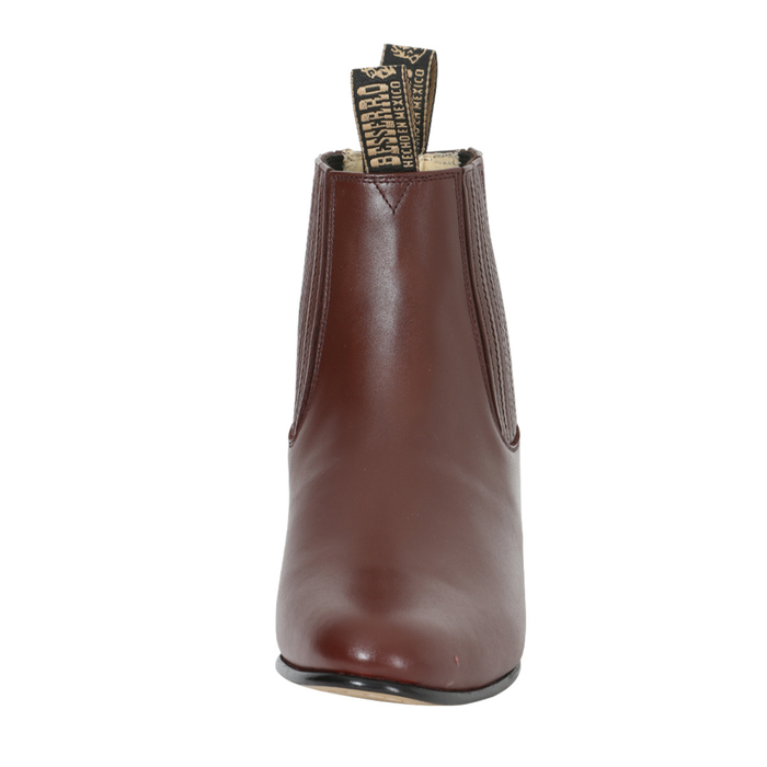 wine leather short western ankle boot with elastic side panels and low heel.