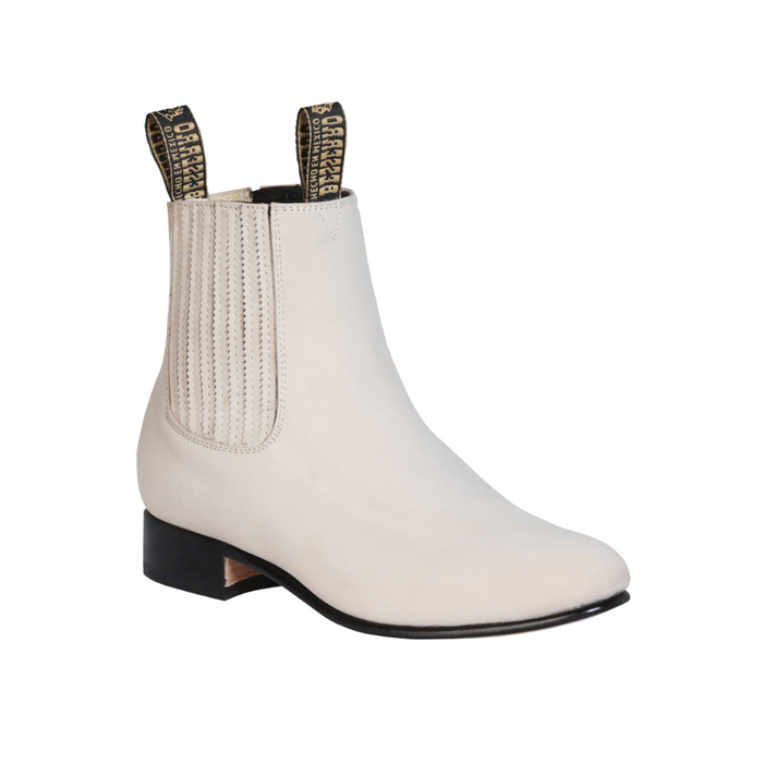 leather short western ankle boot with elastic side panels and low heel.