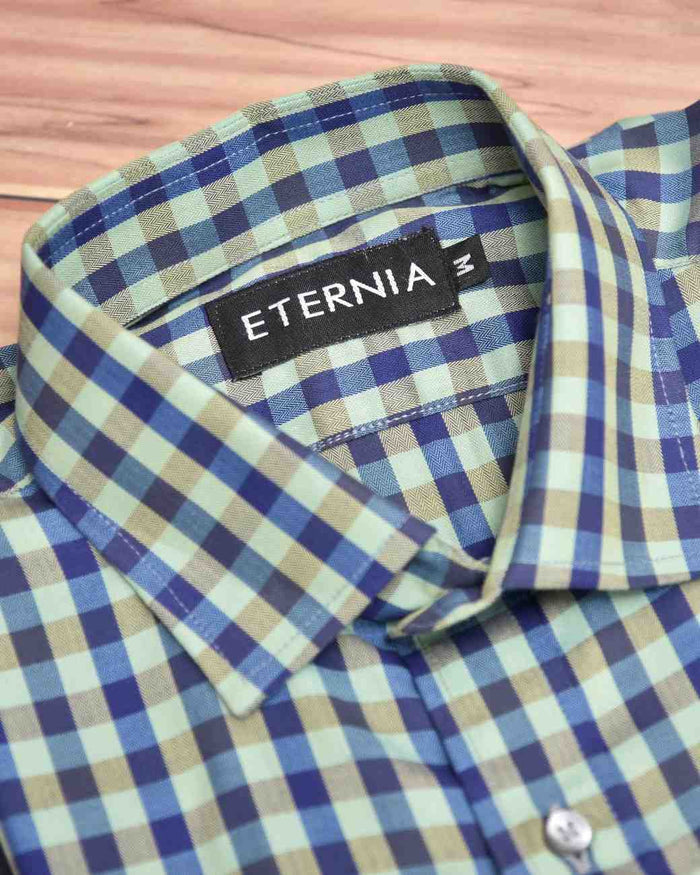 Men's linen shirt collar with blue and green checkered pattern and inner label