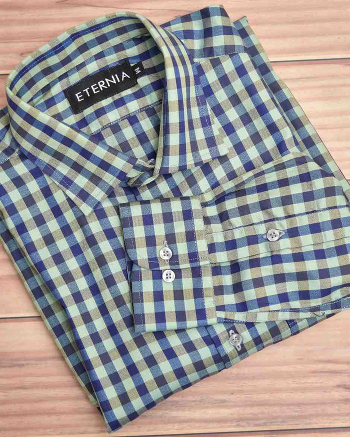 Men's linen shirt front with blue and green checkered pattern, button placket and sleeves