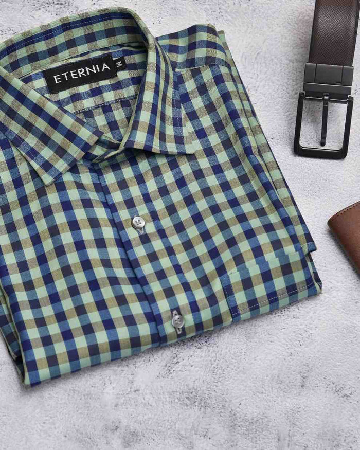 Men's linen shirt with blue and green checkered pattern, spread collar and button cuffs
