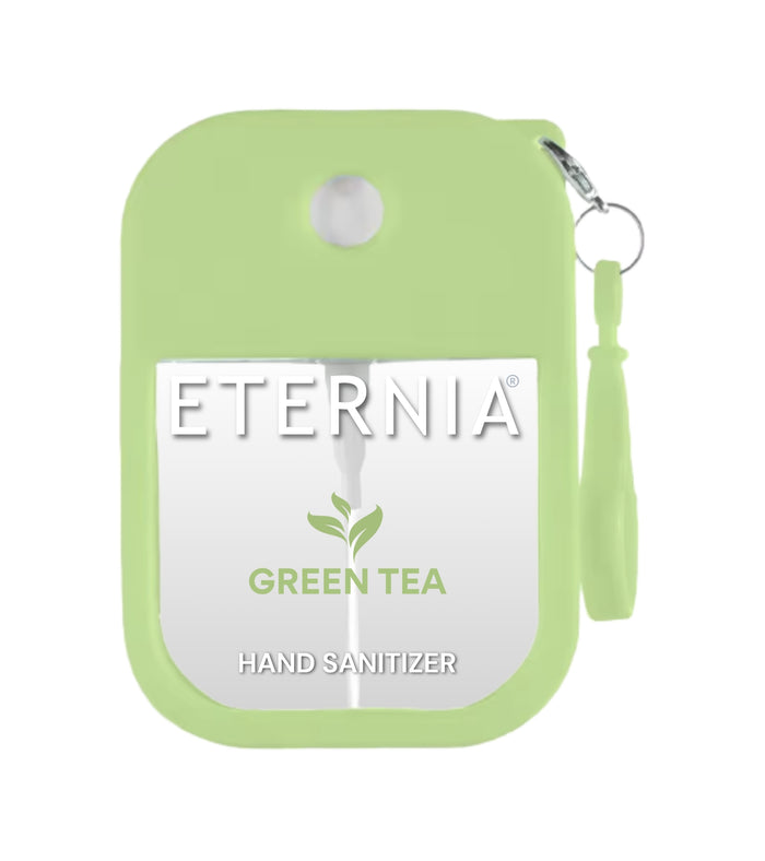 Green hand sanitizer spray bottle with keyring and label