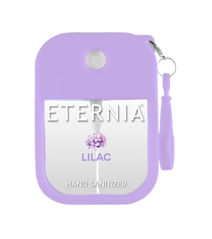 Lilac hand sanitizer spray with Eternia logo and keyring loop
