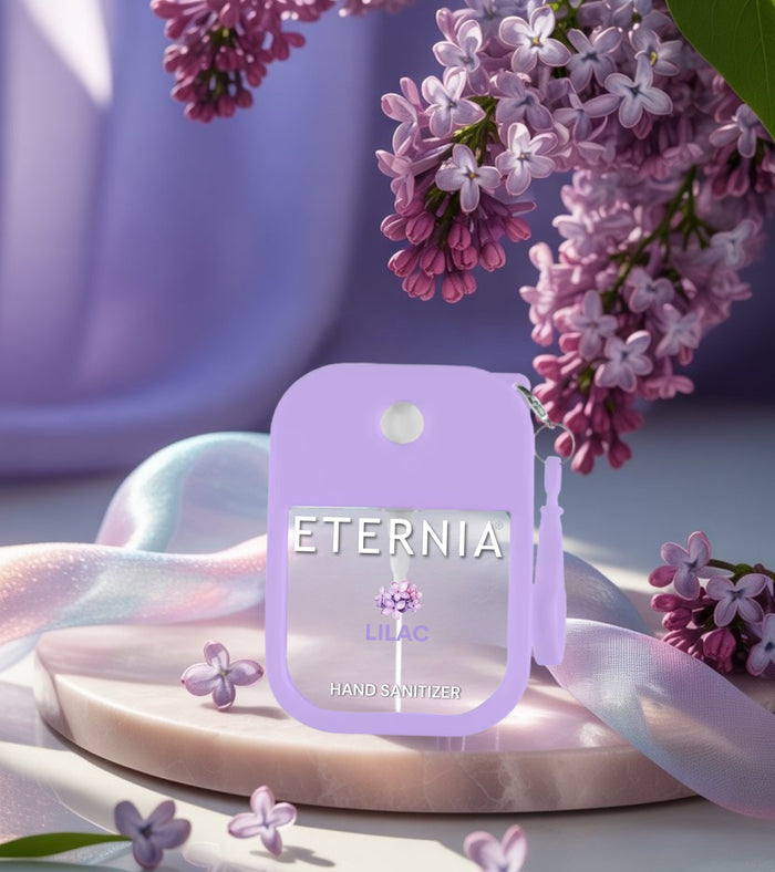 Lilac hand sanitizer spray with flower-style Eternia label, rounded case