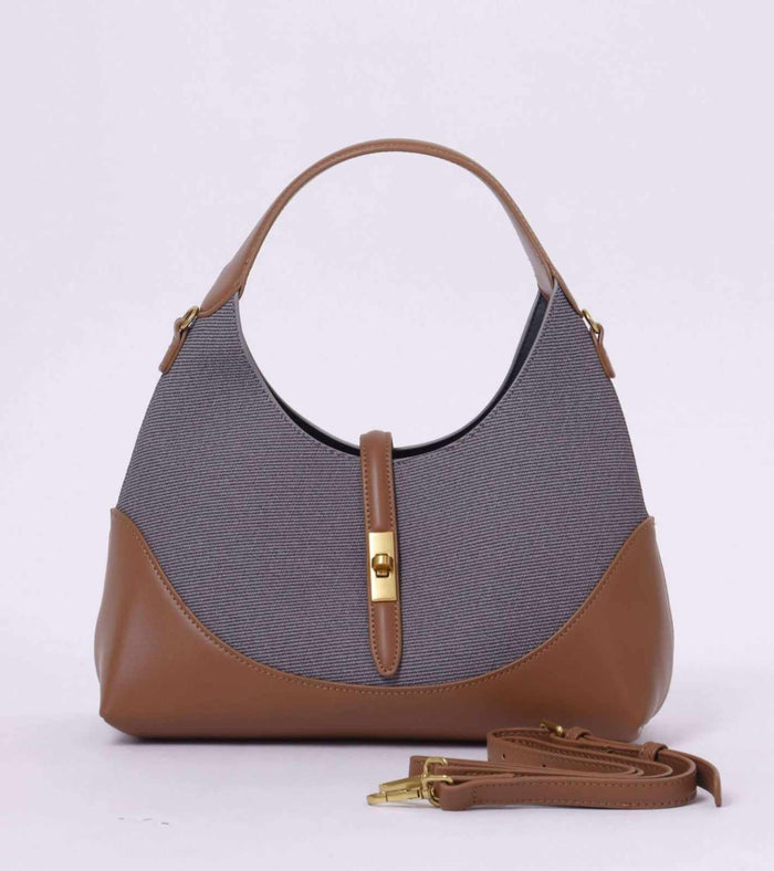 Grey tweed hobo shoulder bag with tan leather sides, top handles and gold-tone hardware