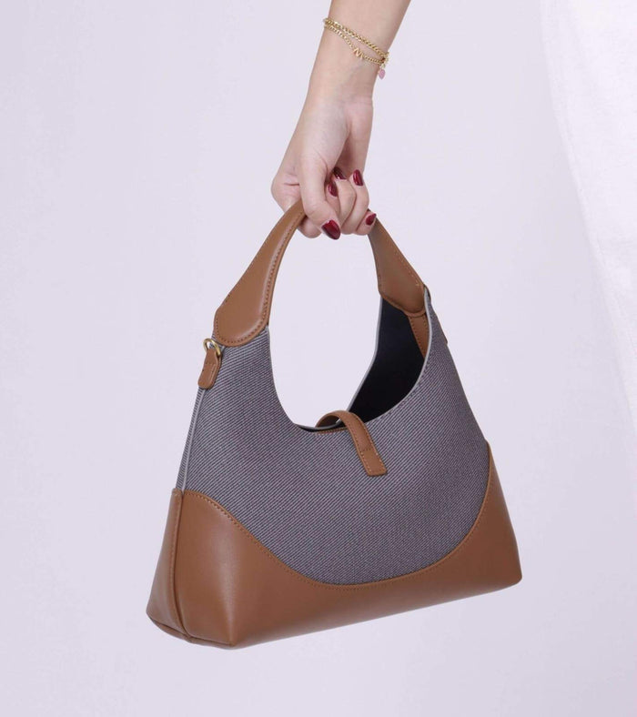 Grey tweed hobo bag with tan vegan leather base, detachable string strap and top handles
