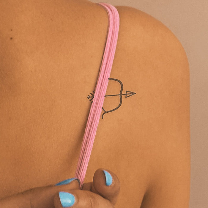 Pfeil und Bogen Tattoo