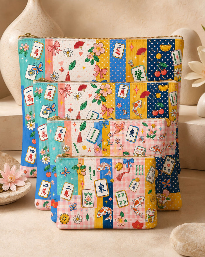 Colorful patchwork print vegan leather zipper pouch with gold zipper pull