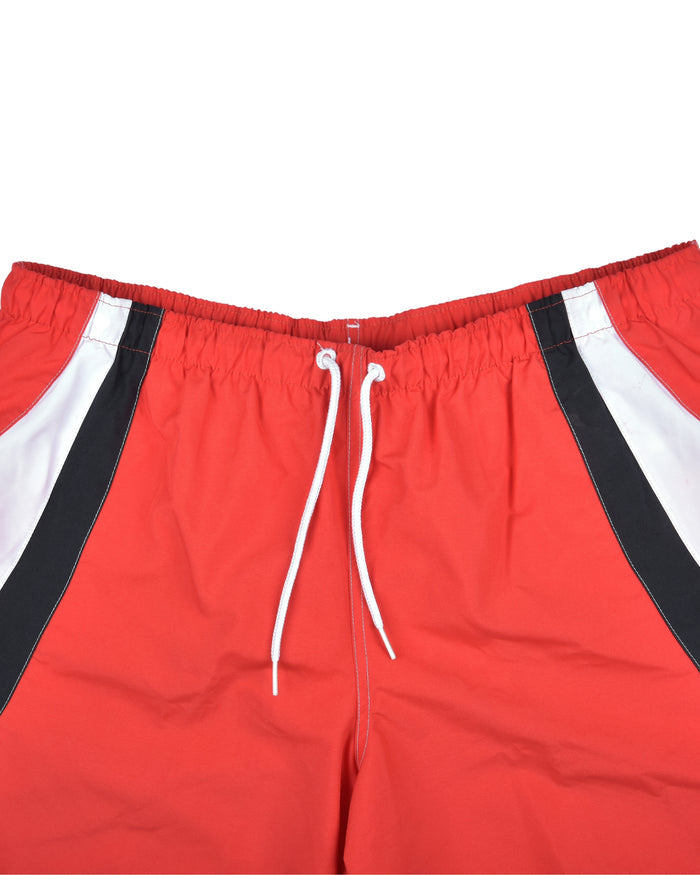 Men's red swim shorts with white drawstring cords and black side stripe