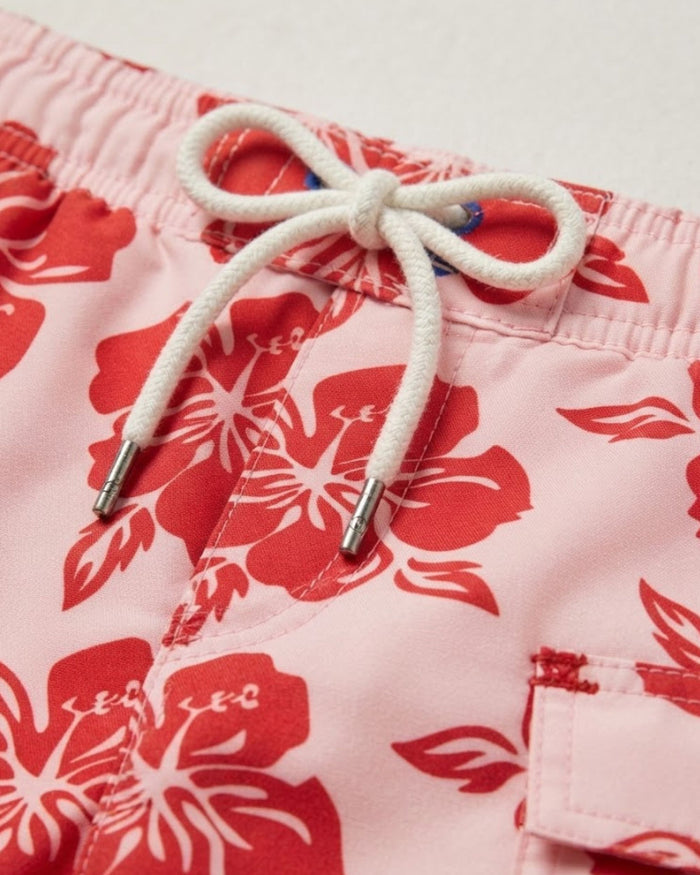 Pink swim shorts detail, red hibiscus print with white drawstring and side pocket