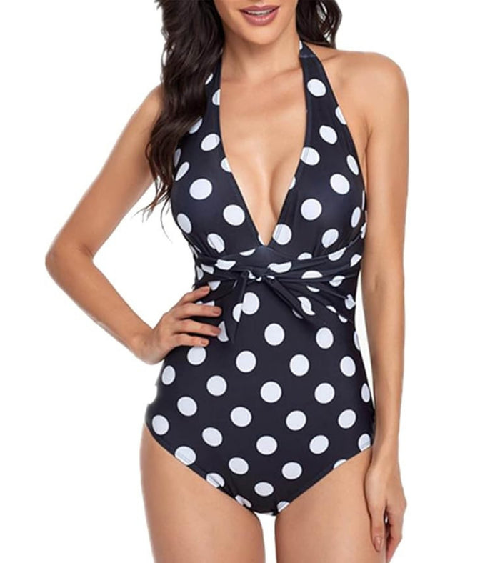 Women's halter one-piece swimsuit, black/white polka dots, ruched wrap front.