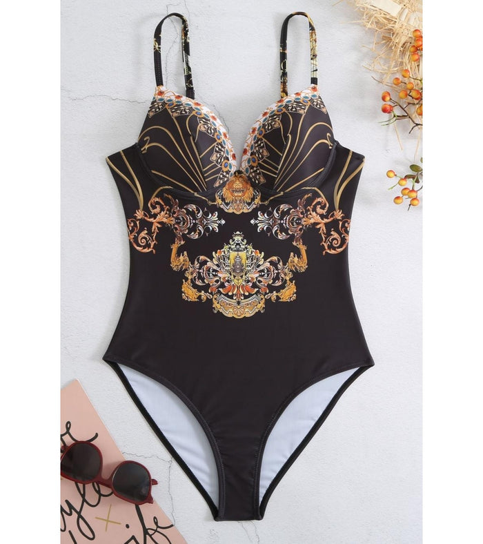 One-piece swimsuit with V-neck and deep backless cut, black with ornate gold print