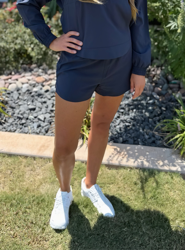 Rhone Apparel- "2.5" Mirage Short- Navy Blue - Tres Chic Boutique