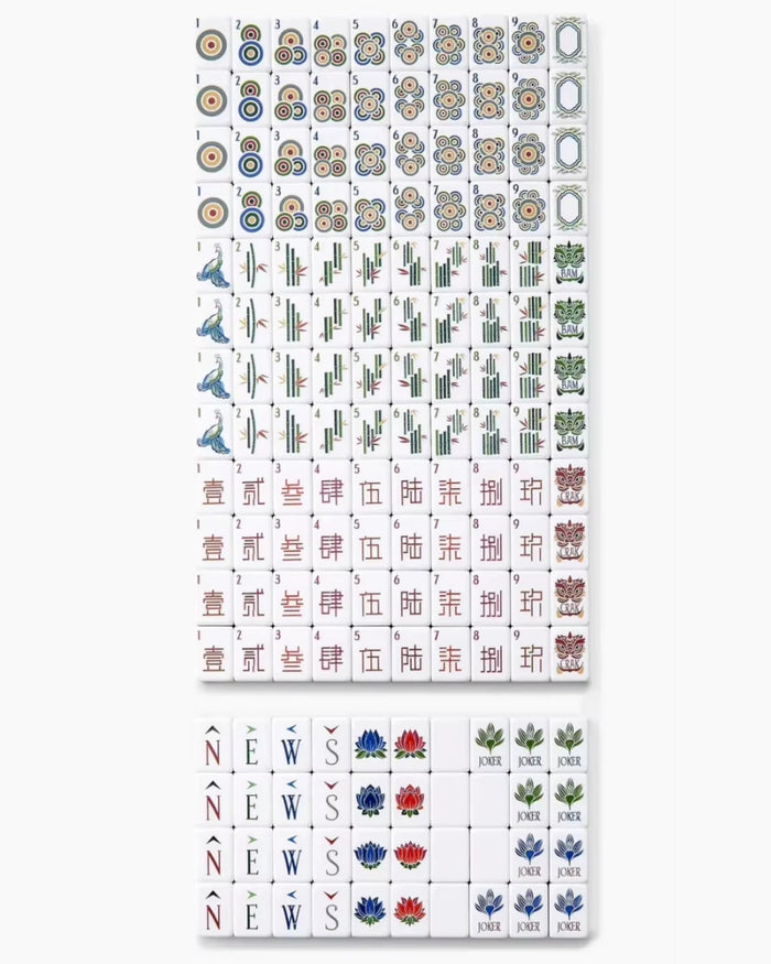 Acrylic mahjong tiles laid out in a grid, with jokers and suit tile faces